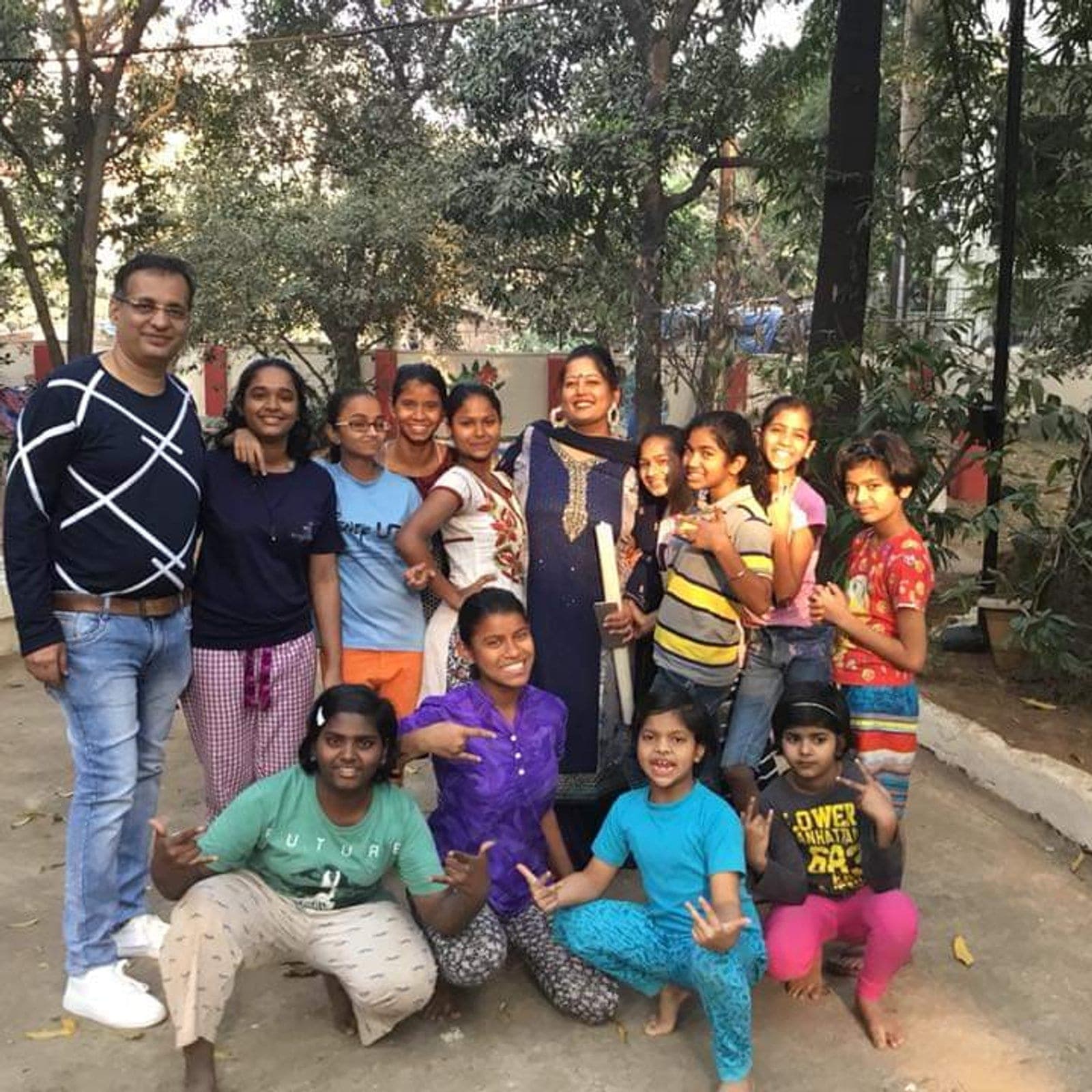 Children with their paintings at a Sanskriti Arts event